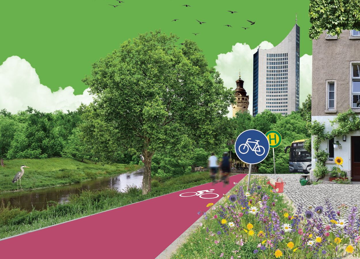 Grüner Park mit Fahrradweg, Wildblumenwiese, Bus und modernen Gebäuden im Hintergrund in Leipzig