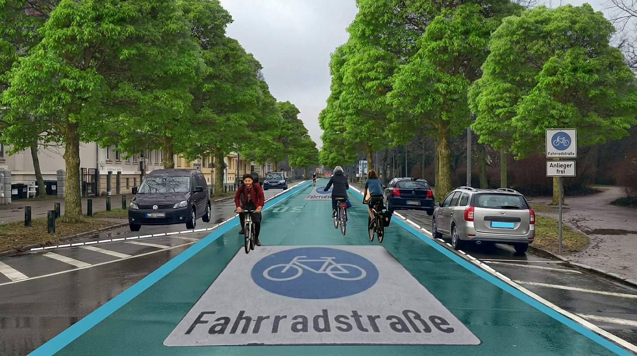 Visualisierung der Naunhofer Straße als blau markierter Fahrradstraße mit Radfahre:innen